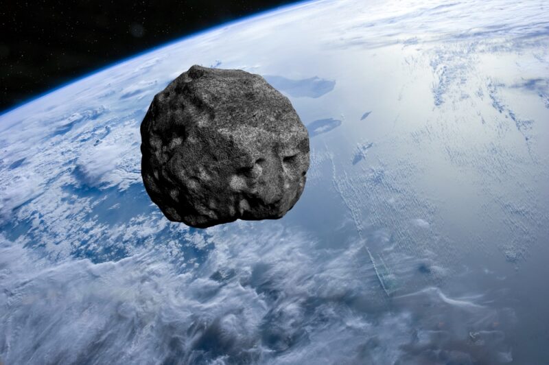 asteroid over earth