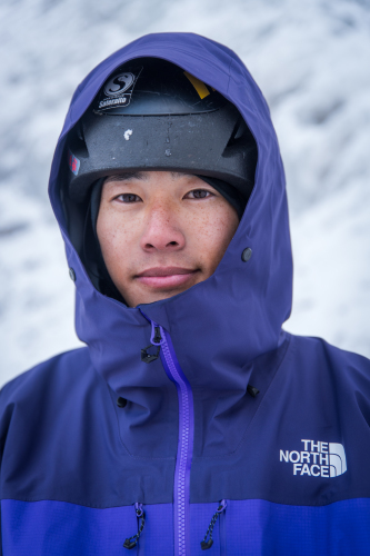 Close shot of Yudai Suzuki in a blue gore-tex jacket