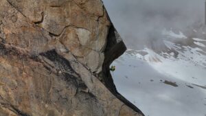 A climber tackles an overhanging pitch.