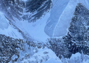 The great couloir of Annapurna showing a bare ice rib to the right, the rocky floor and the broken blocks of ice at the base.