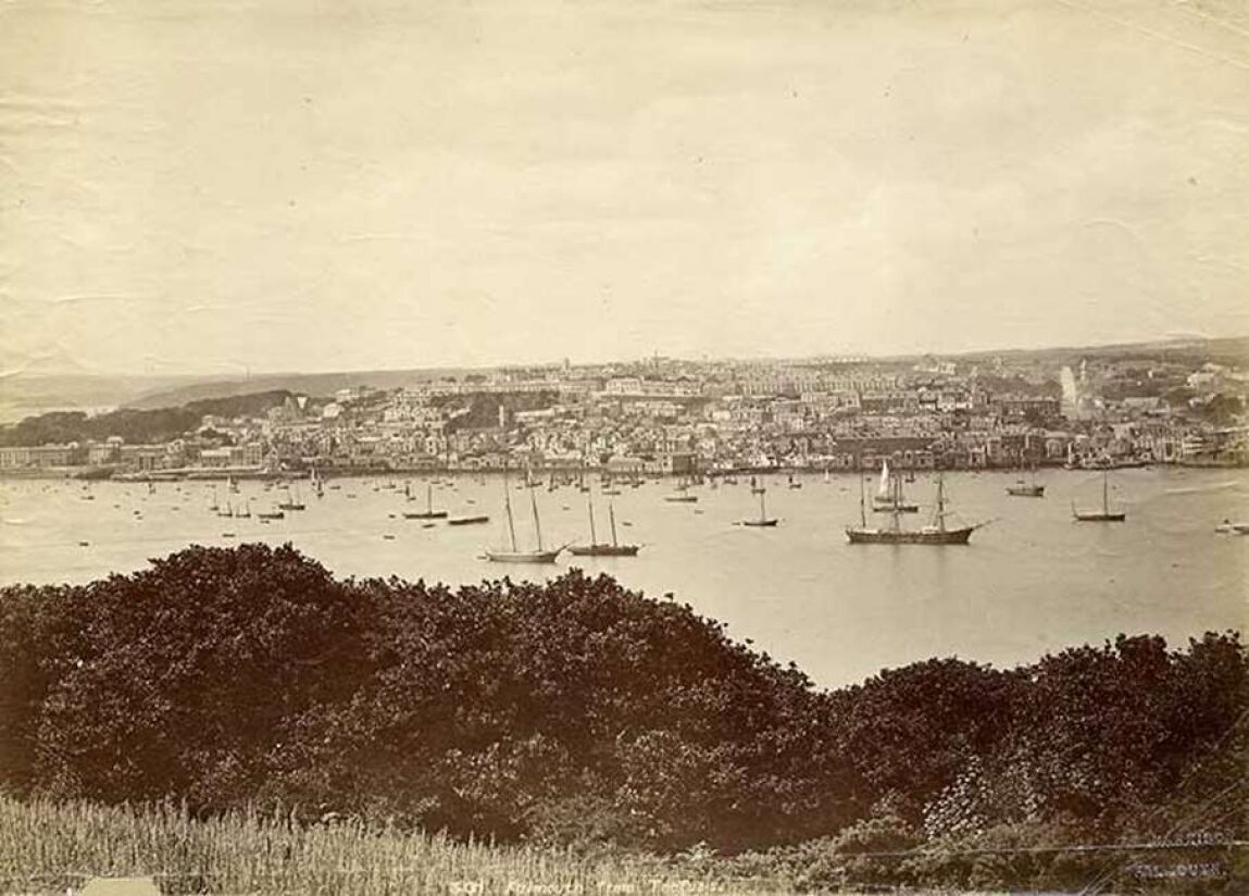 Vintage photograph of a harbor with sailing ships