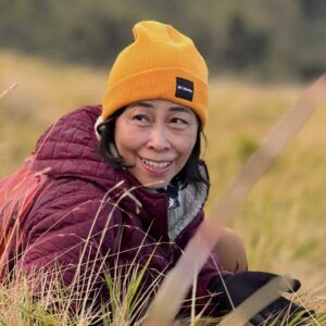 Close shot of Wijayati, with a yellow beanie