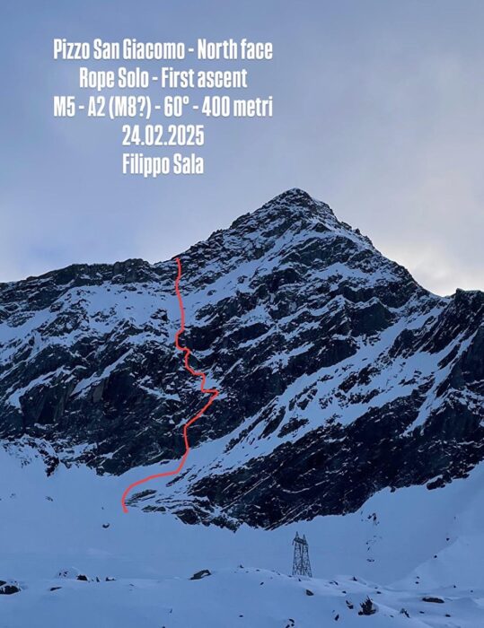 Route topo marked in red on a photo of Pizzo San Giacomo. 