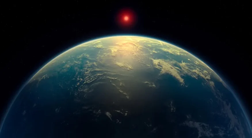 A red star over an ocean world.