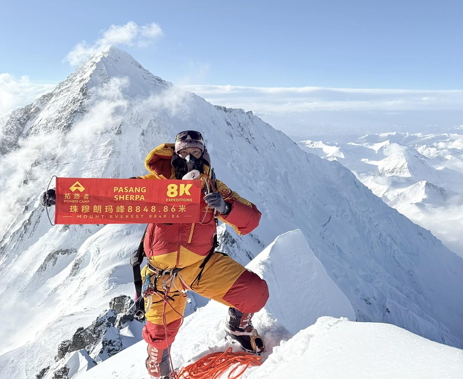 One of the Sherpa rope-fixers yesterday on the summit of Lhotse, with Everest in background.