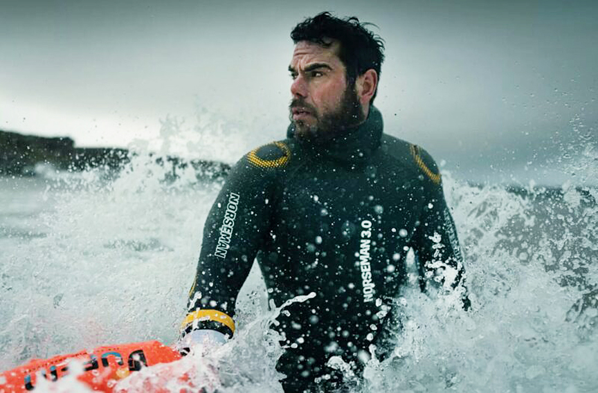 bearded man in splashy water