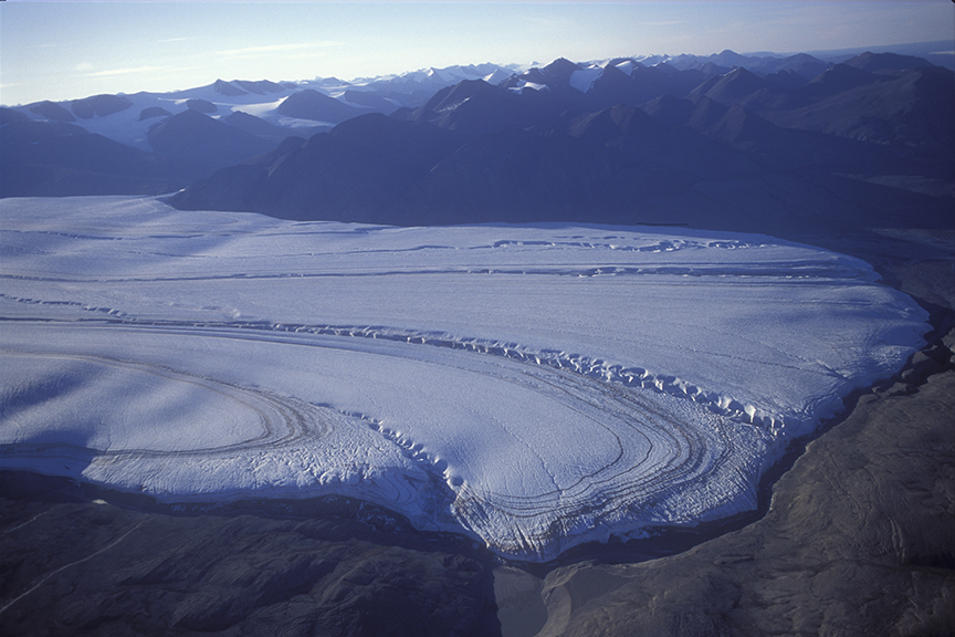 a peak and a glacier from the air