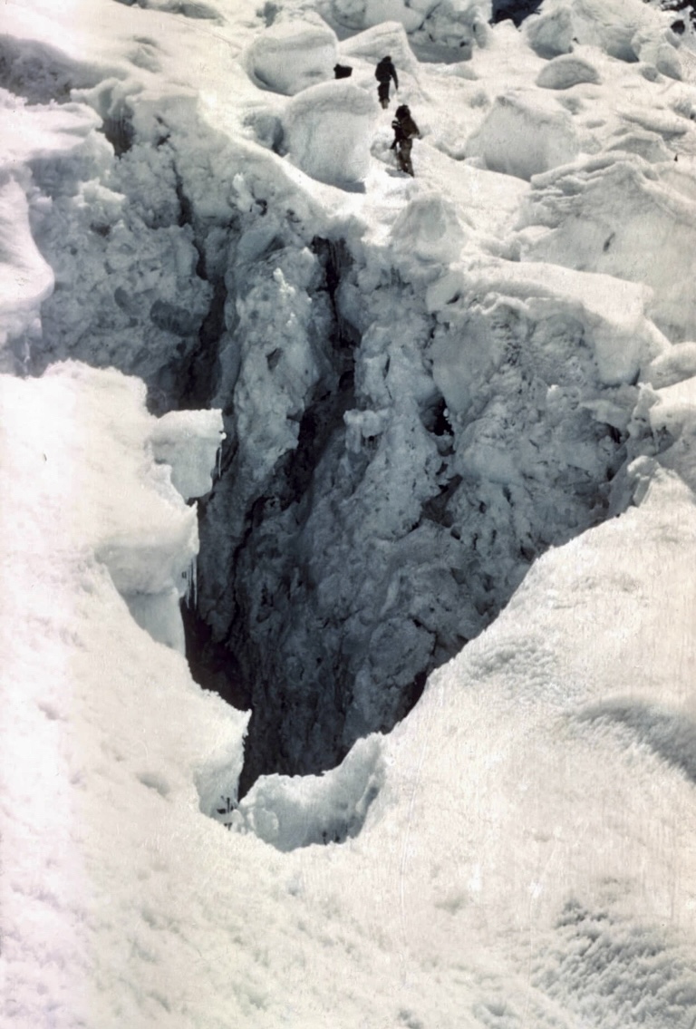 Crossing a crevasse in 1955.