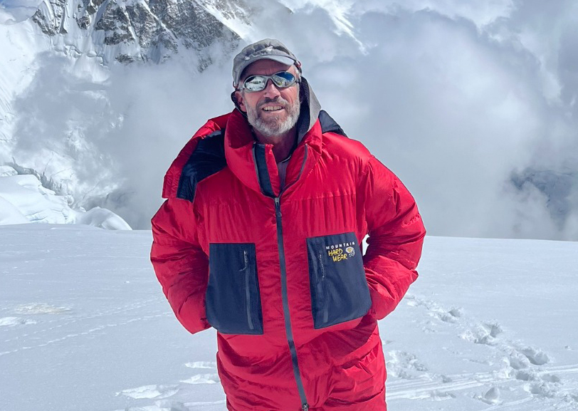 portrait of guy in red down suit