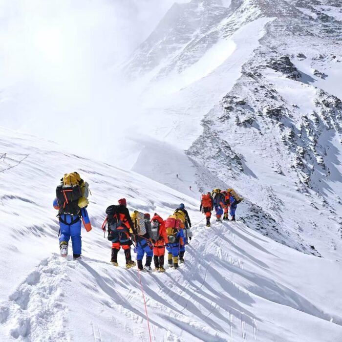 Climbers in line heading to a big col on the north side of Everest