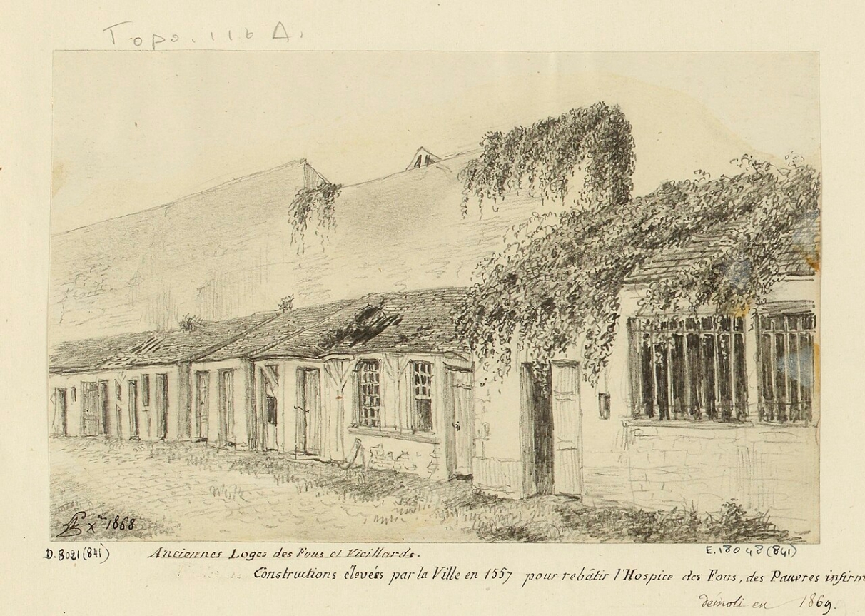 A pencil sketch of a row of low buildings