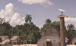 A traditionally constructed building with an antenna