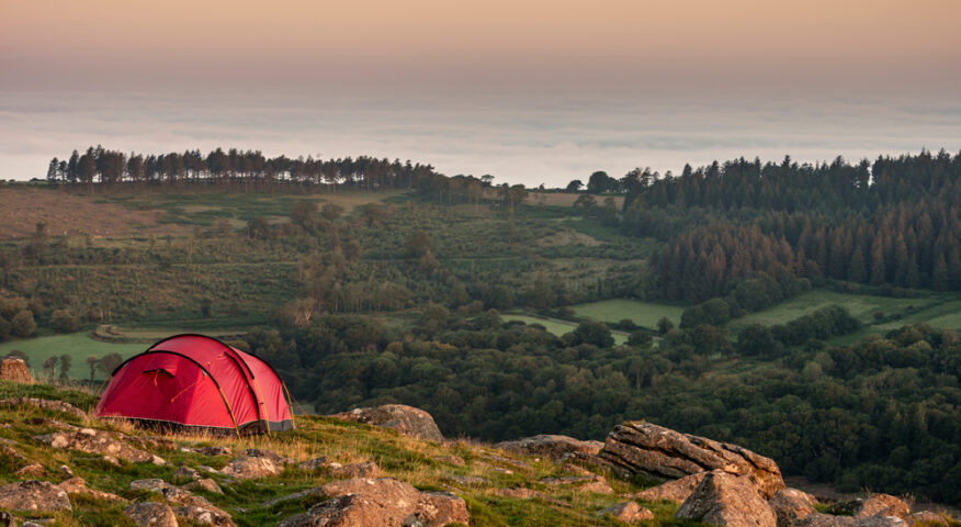 A tent on the moor at sunset