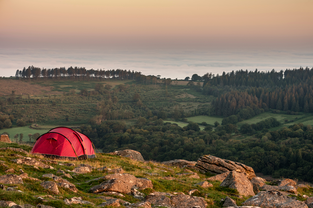 A tent on the moor at sunset
