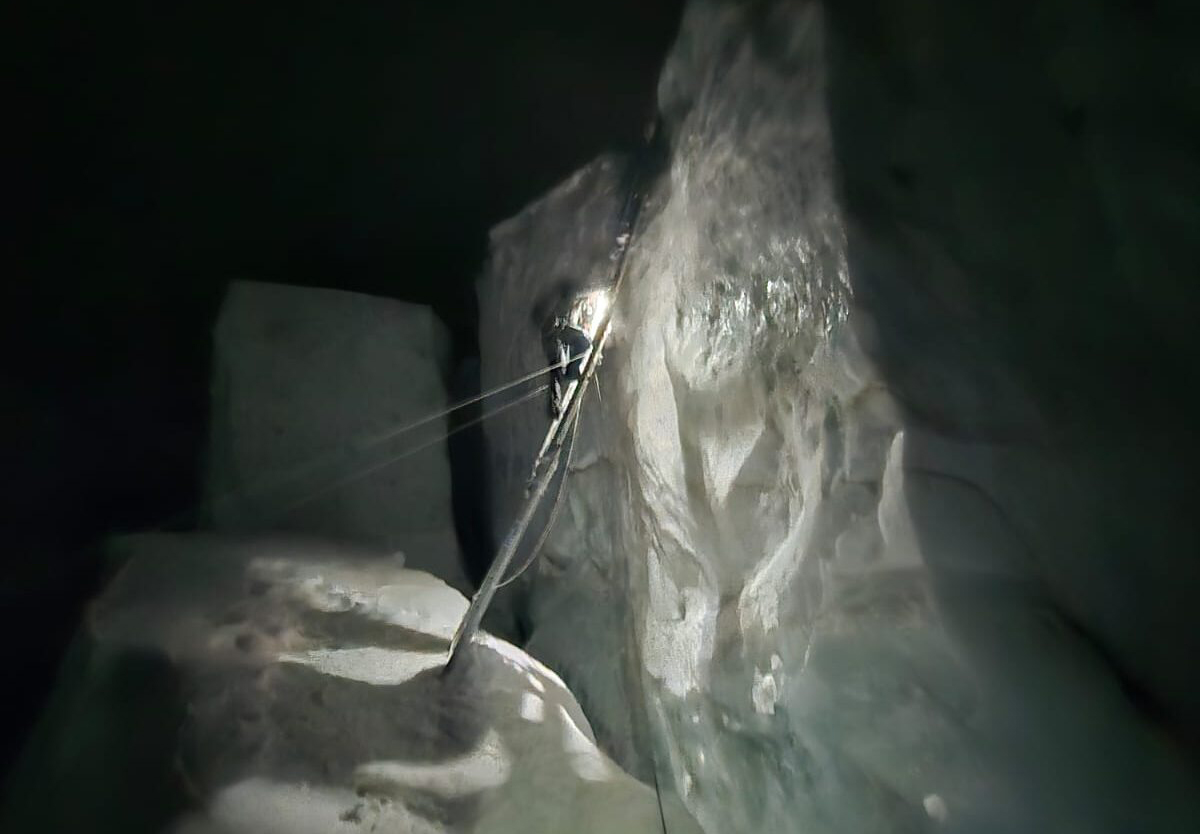 climber going up a ladder