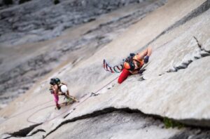 Kate Kelleghan and Laura Pineau climbing.