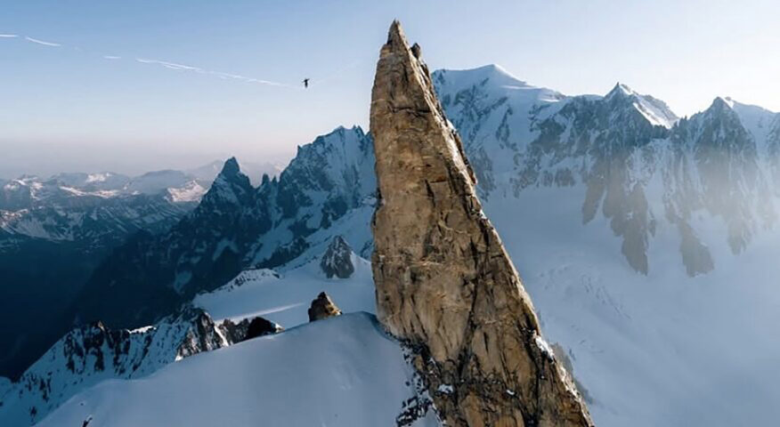 One of the members crossing the 788m long highline between Dent du Geant and Mont Mallet.