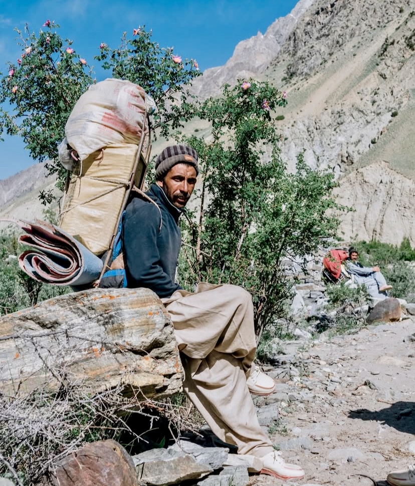 One of the porters during the approach trek to Spantik.