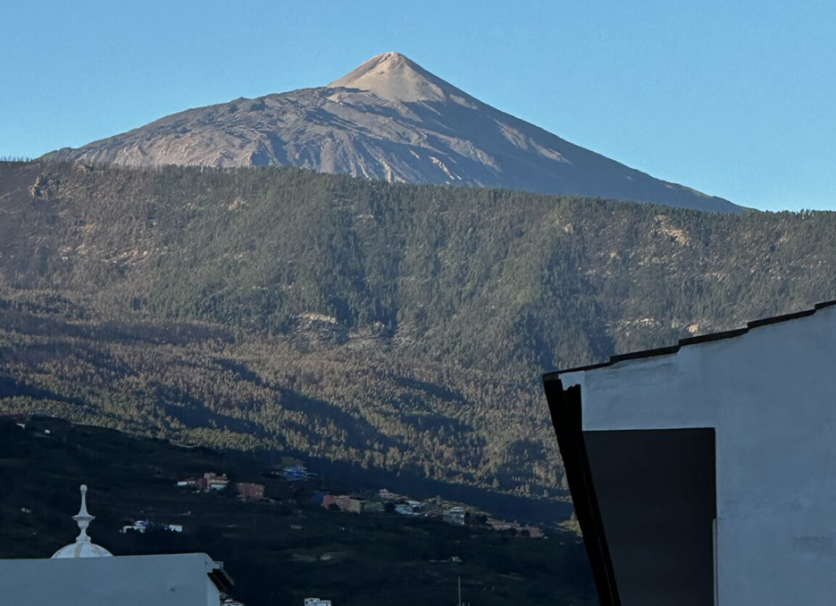 distant mountain seen from city window