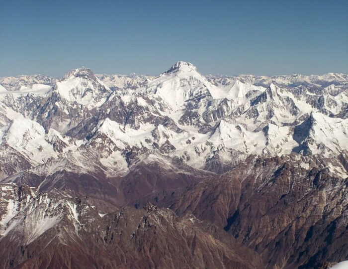 Aerial view of karakoram peaks covered in snow.