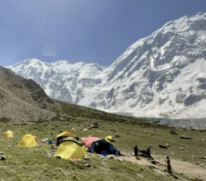 Tents on the grassy plains at the base of Nanga Parbat.