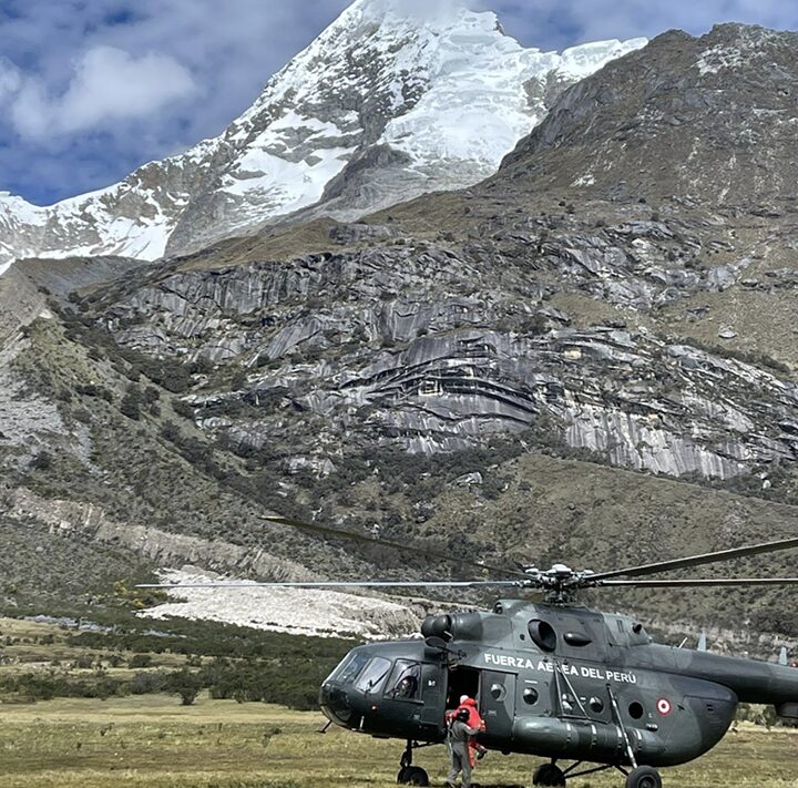 rescue helicopter landed in mountain environment