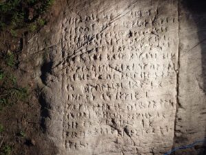 runes carved into a rock