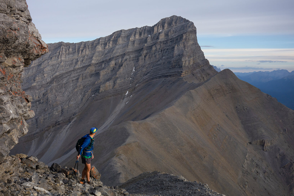 hiker on scrambly mountain terrain