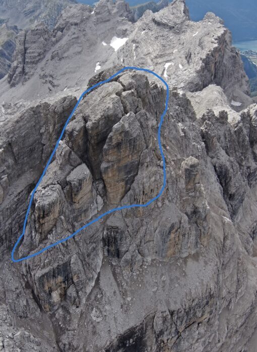 An aerial photo of Cima Falkner with the area affecgted by rockfall marked in blue.