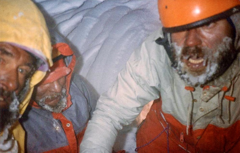 From left to right: Andrzej Zyga Heinrich, Jerzy Kukuczka, and Slawomir Lobodzinski, iduring an improvised bivouac in a snow cave, during the descent from Camp 5 on the Rupal Face of Nanga Parbat in 1985.