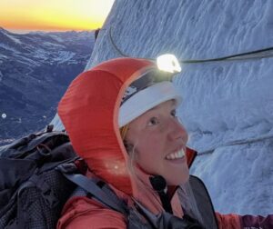 Dahlmeier looks up in excitement while on a vertical ice section of the Eiger's North face.