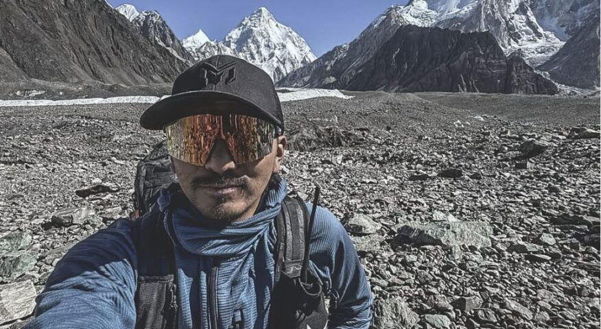 Mingma David takes a selfie at Concordia with K2 in background.