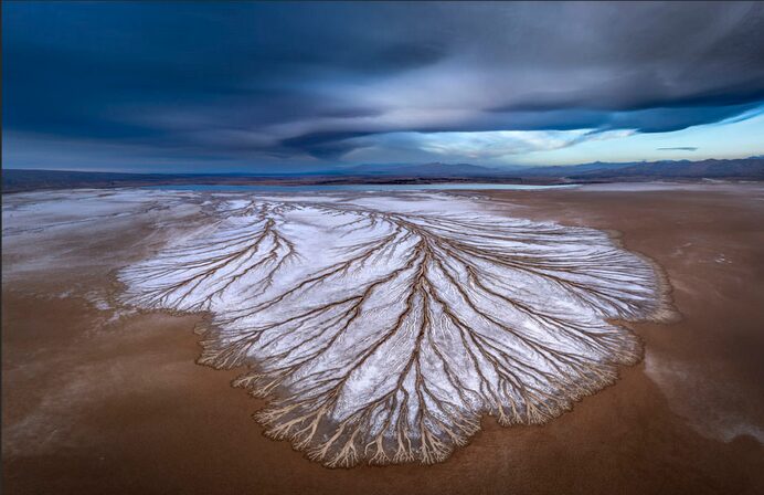 Ice spreading over a plateau.