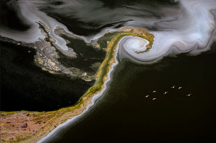 Swirling clouds of water on a lake.