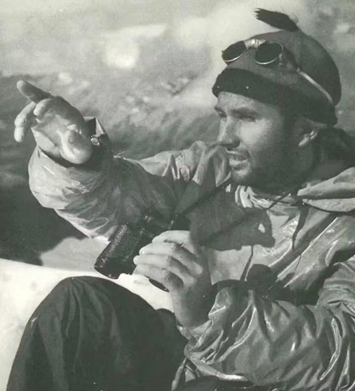 b/w portrait of seated mountaineer