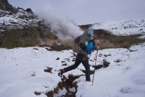 A person walking through snow in Iceland