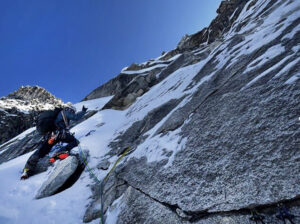 a climber on a mixed face