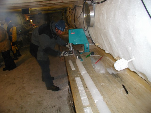Man processing an ice core in the drill tunnel
