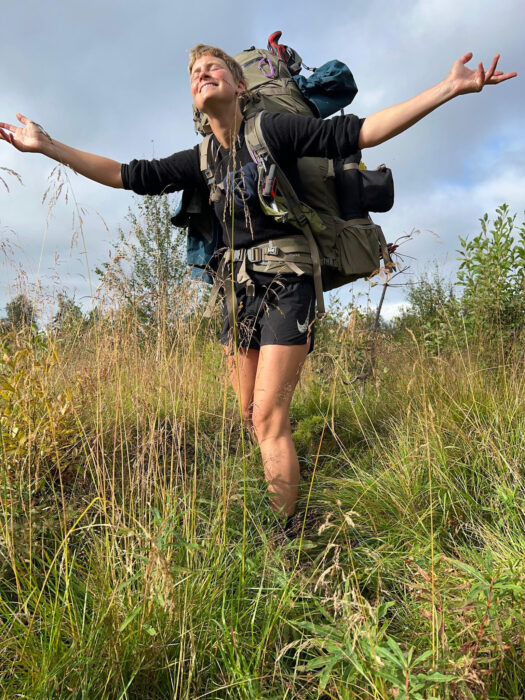Katharina Kneip with a large backpack.