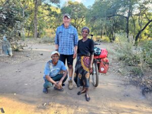 cyclist and local family