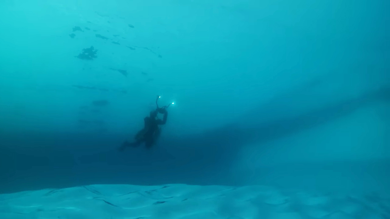diver under the ice