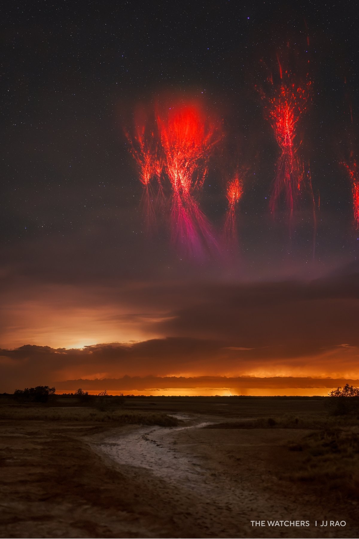 Glowing red lines above flatlands.