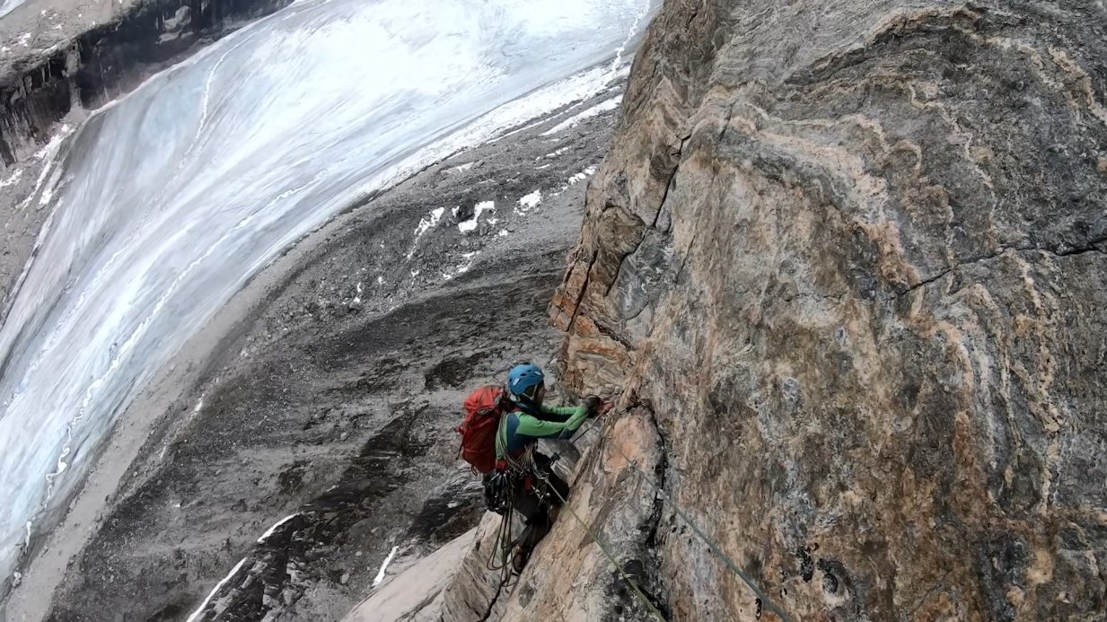 climbing a rock face