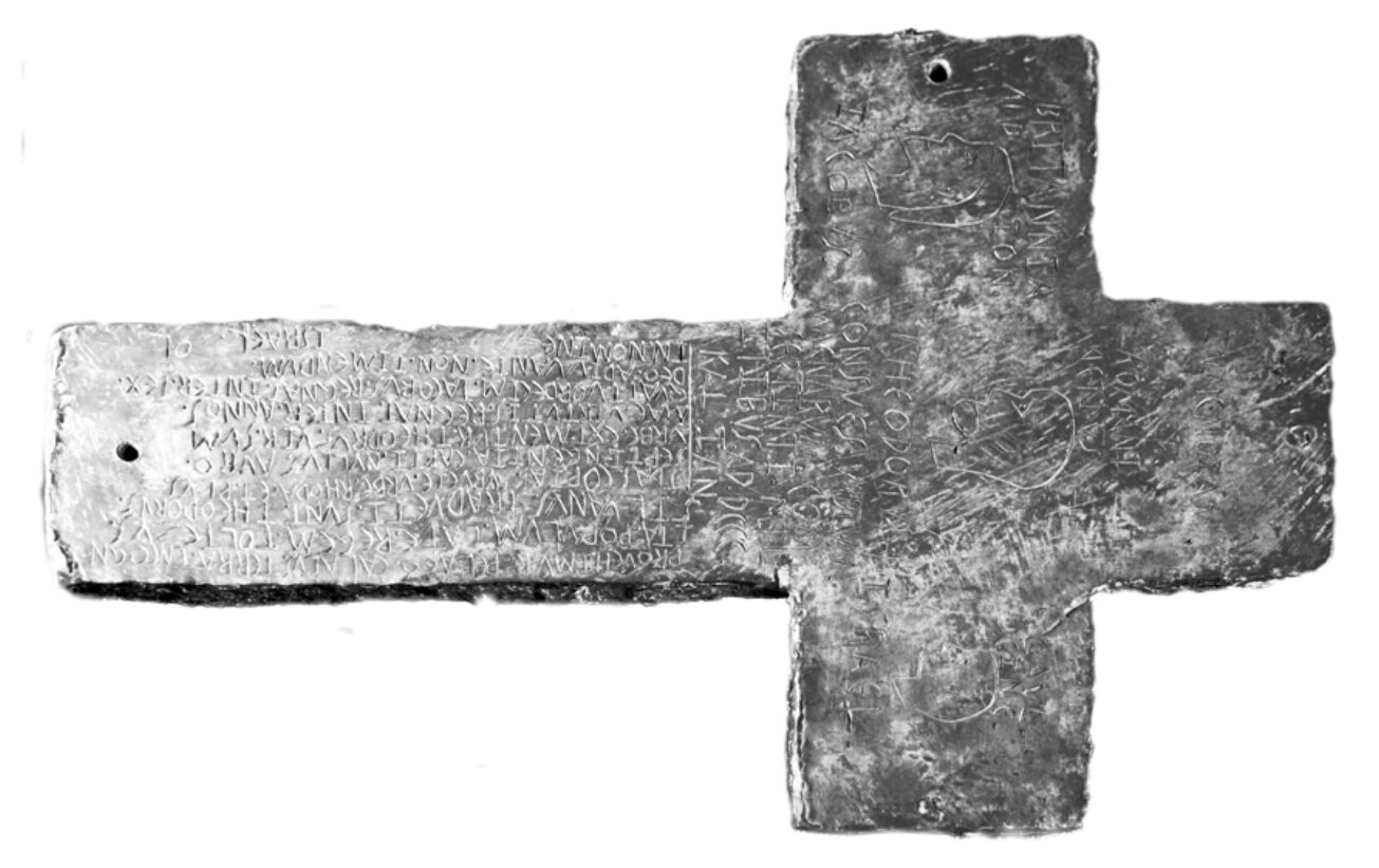 A lead cross with inscriptions