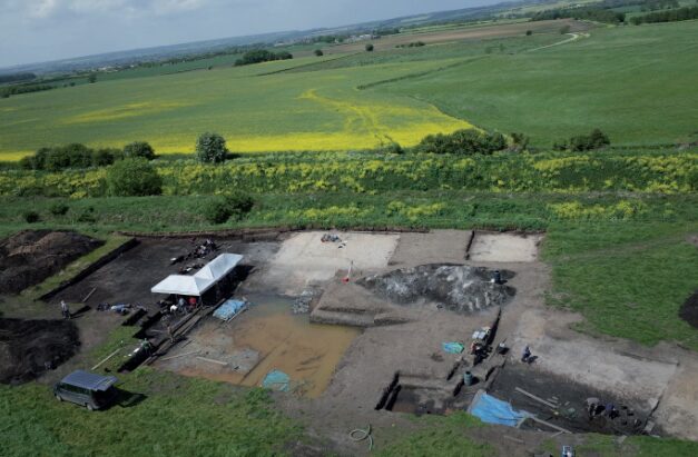 An archaeology dig in a field.