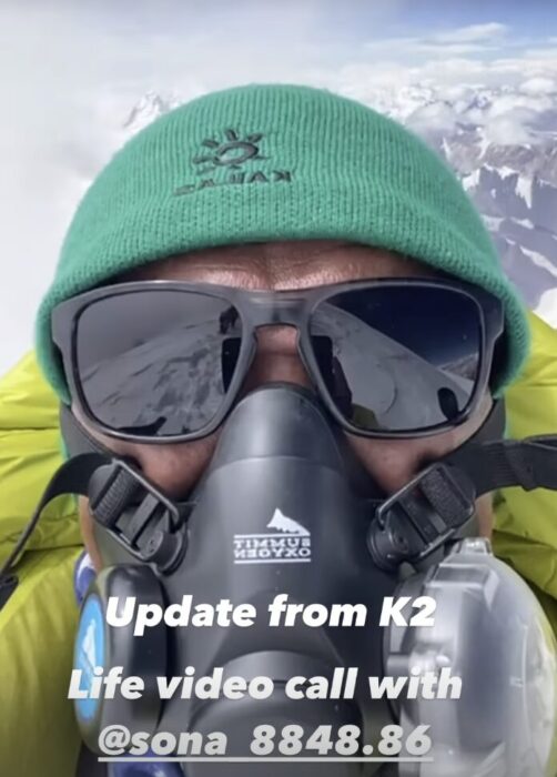 Sona Sherpa in sunglases, O2 mask and woolen cap.
