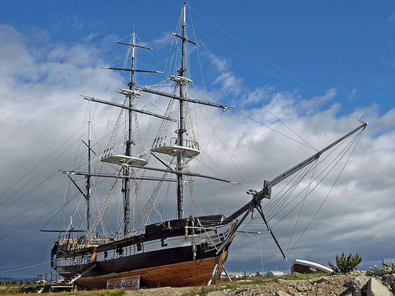 A tall ship aground