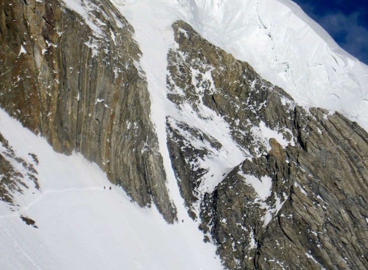 The three Iranian cli,bers can be seen toward the far end of the iitial traverse onto the west face, in the summer of 2013.