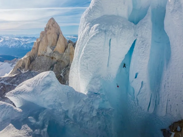 Haley starting up the first pitch above the Headwall, with Fitz Roy behind.