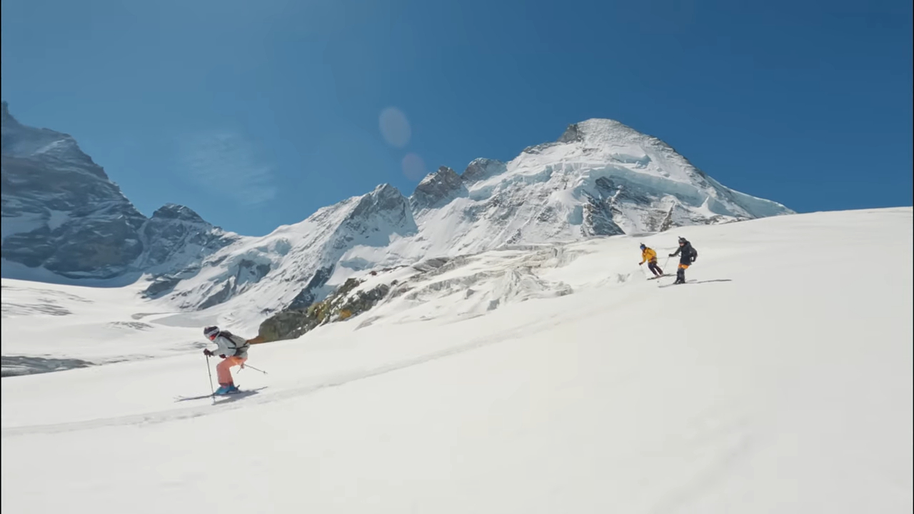 Three skiiers